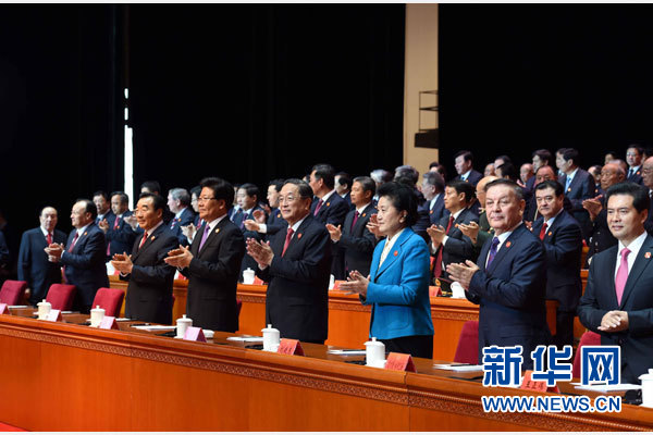 10月1日，慶祝中華人民共和國成立66周年暨新疆維吾爾自治區成立60周年大會在新疆人民會堂隆重舉行。 新華社記者 饒愛民 攝 