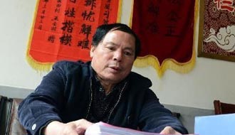 記“鄉村判官”楊斌圣
