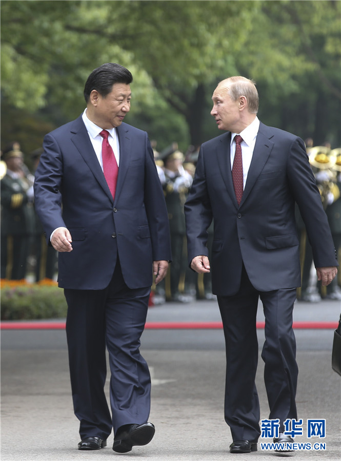 這是會談前，習近平在上海西郊會議中心廣場為普京舉行歡迎儀式。 新華社記者 蘭紅光 攝
