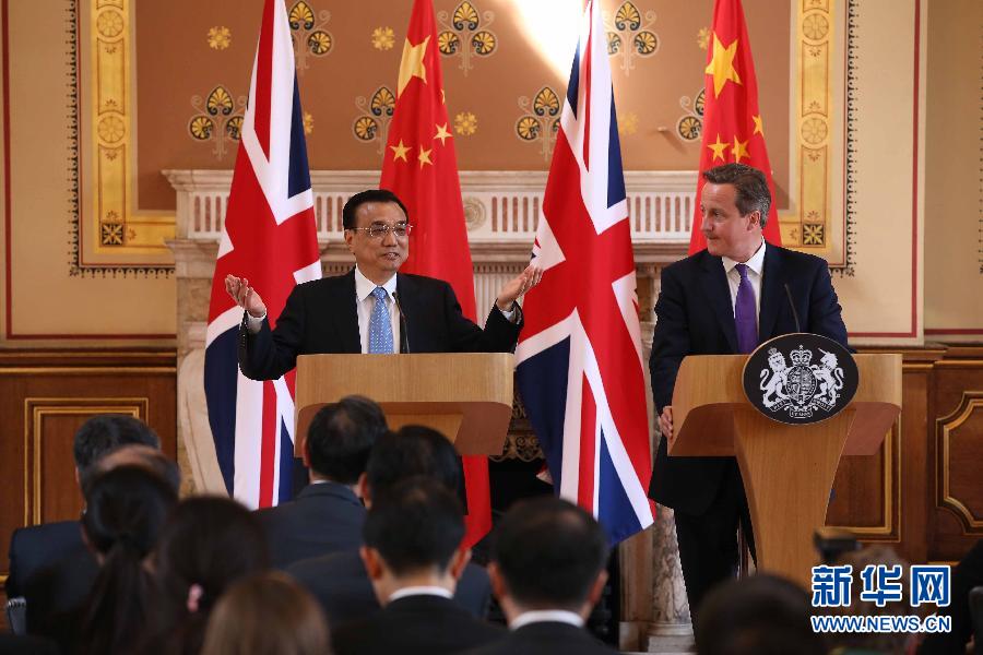 6月17日，國務院總理李克強同英國首相卡梅倫在倫敦舉行中英總理年度會晤后共同會見記者。新華社記者 龐興雷 攝
