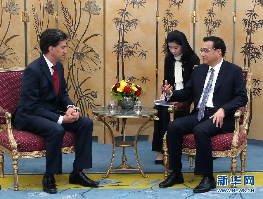 6月18日，國務院總理李克強在倫敦會見英國工黨領袖埃德·米利班德。新華社記者 龐興雷 攝