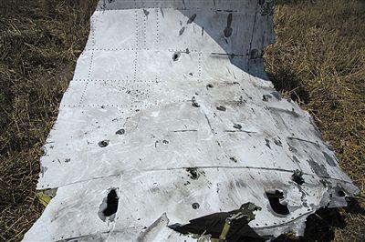 MH17墜機現場照片下藏著多少信息？