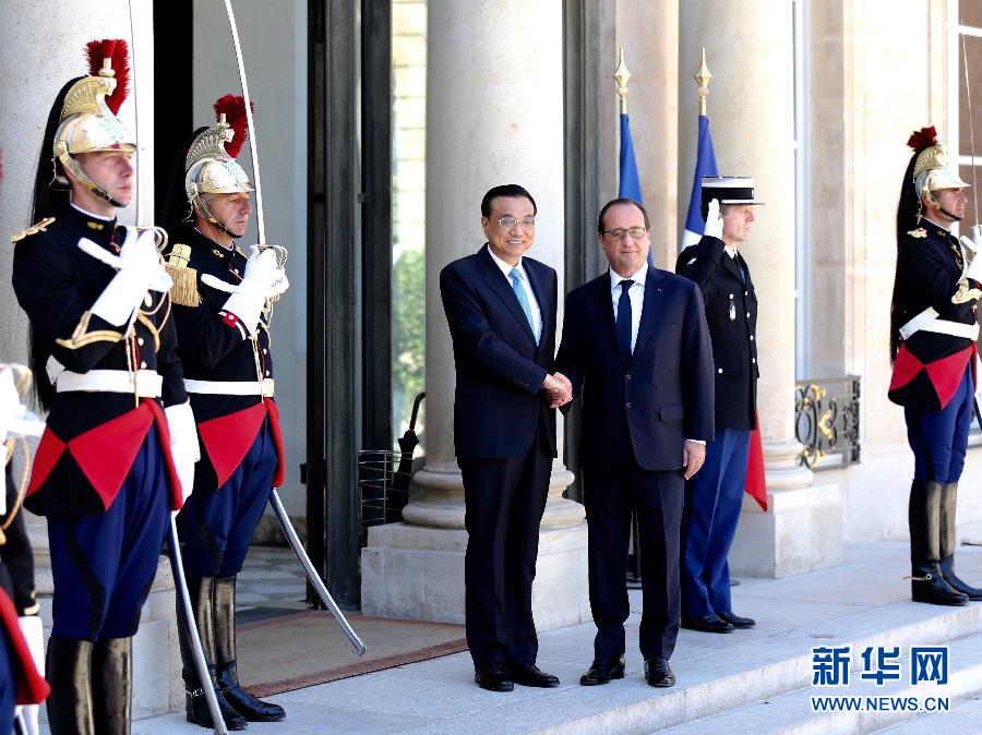 當地時間6月30日下午，中國國務院總理李克強在巴黎愛麗舍宮會見法國總統奧朗德。 新華社記者馬占成攝 