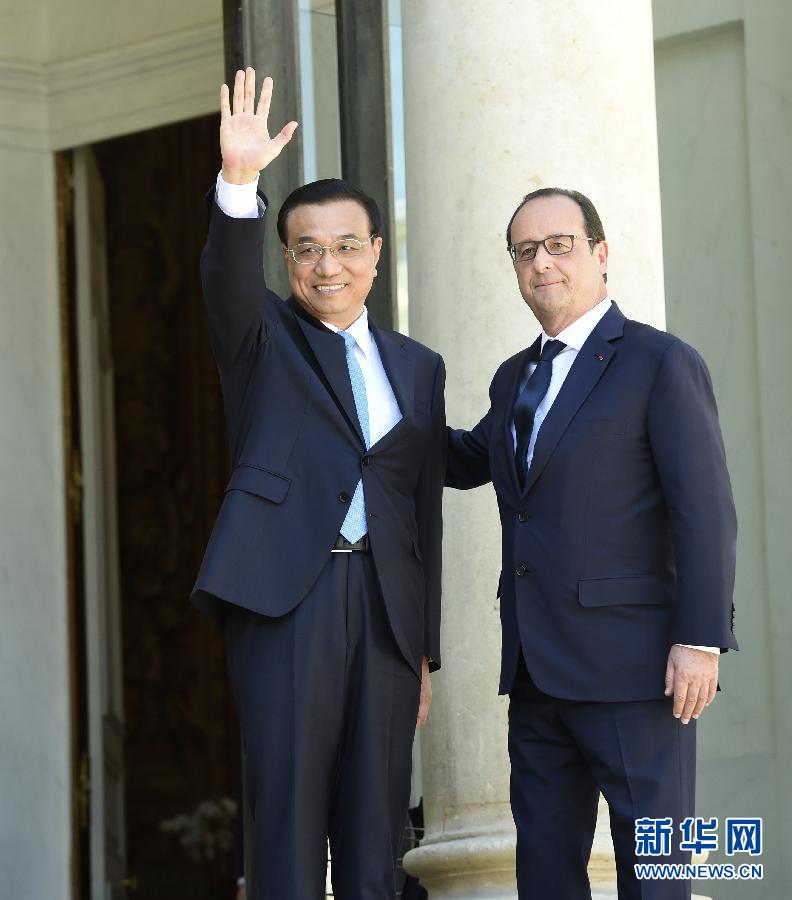 當地時間6月30日下午，中國國務院總理李克強在巴黎愛麗舍宮會見法國總統奧朗德。 新華社記者李學仁攝 