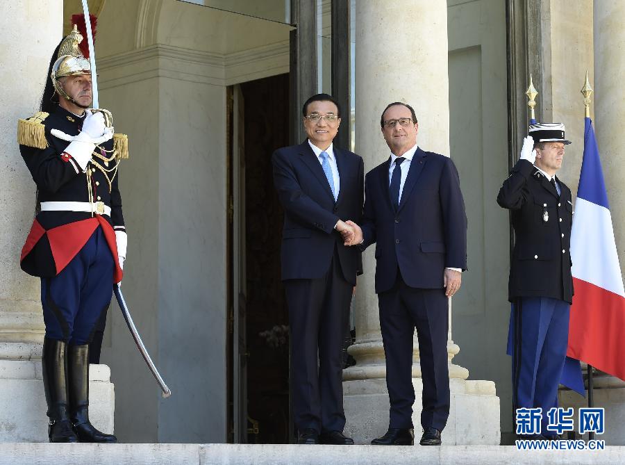 當地時間6月30日下午，國務院總理李克強在巴黎愛麗舍宮會見法國總統奧朗德。 新華社記者李學仁攝