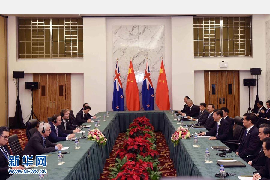 11月18日，國家主席習近平在菲律賓馬尼拉會見新西蘭總理約翰·基。 新華社記者 饒愛民 攝