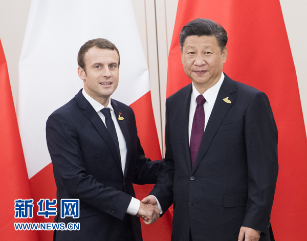 7月8日，國家主席習近平在漢堡會見法國總統馬克龍。新華社記者 李學仁 攝